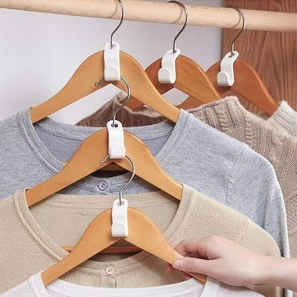 Conector Inteligente™ – O Gancho que Triplica o Espaço do seu Guarda-Roupa