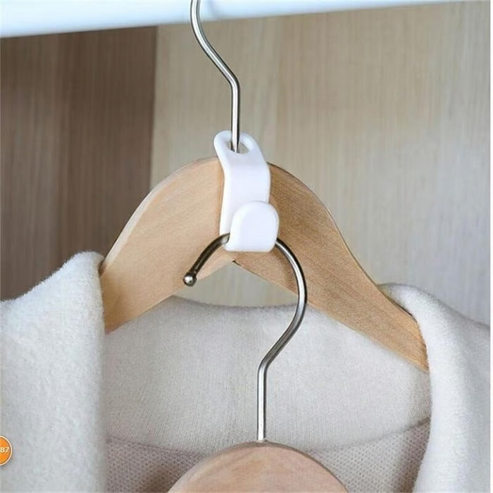 Conector Inteligente™ – O Gancho que Triplica o Espaço do seu Guarda-Roupa