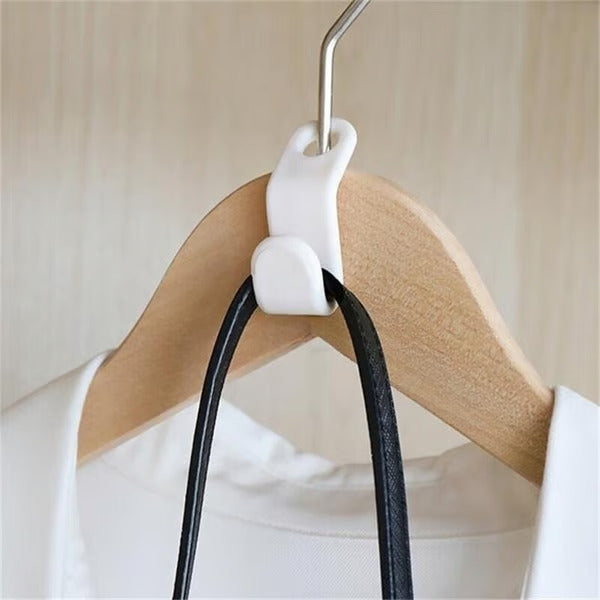 Conector Inteligente™ – O Gancho que Triplica o Espaço do seu Guarda-Roupa